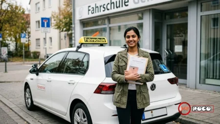 How to Get a Driving License in Germany: A Complete 7-Step Guide International learner driver holding documents beside a Fahrschule car in Germany
